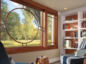 Brown Wooden window circle design for homes