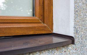 close-up of wooden window and marbled window sill